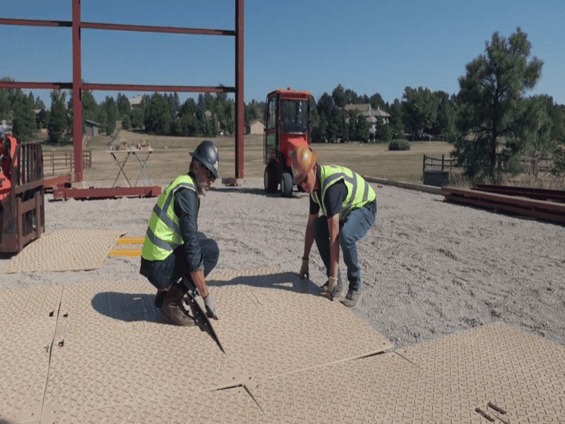 Common Ground Mat Sizes Two different types of 4x8 ground mats side-by-side showing different textures