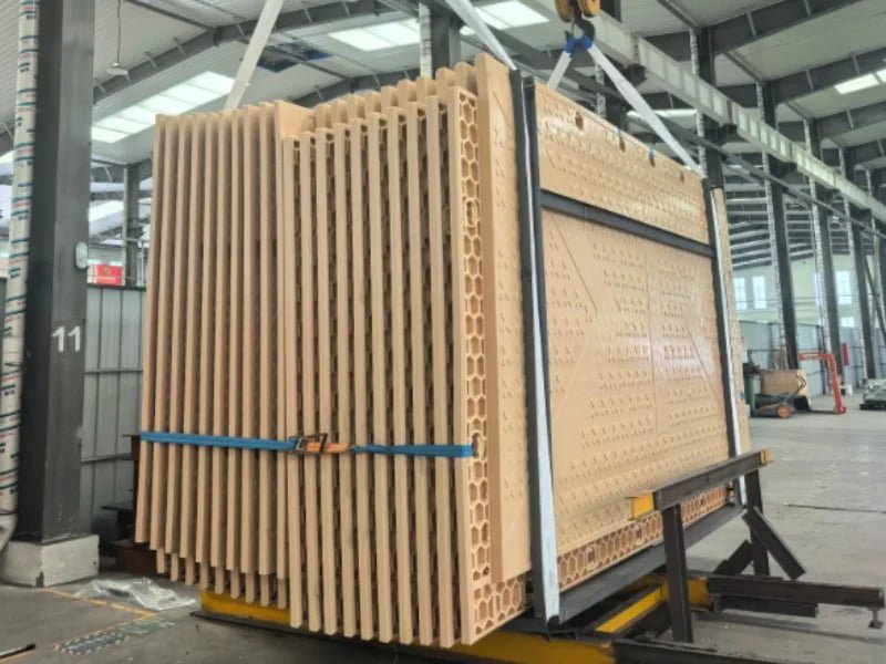 Interlocking heavy-duty ground protection mats installed over soft muddy ground