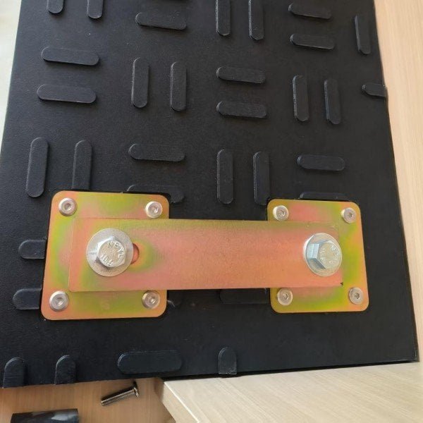 Mechanical bolt connection for hollow-core heavy duty roadway mats